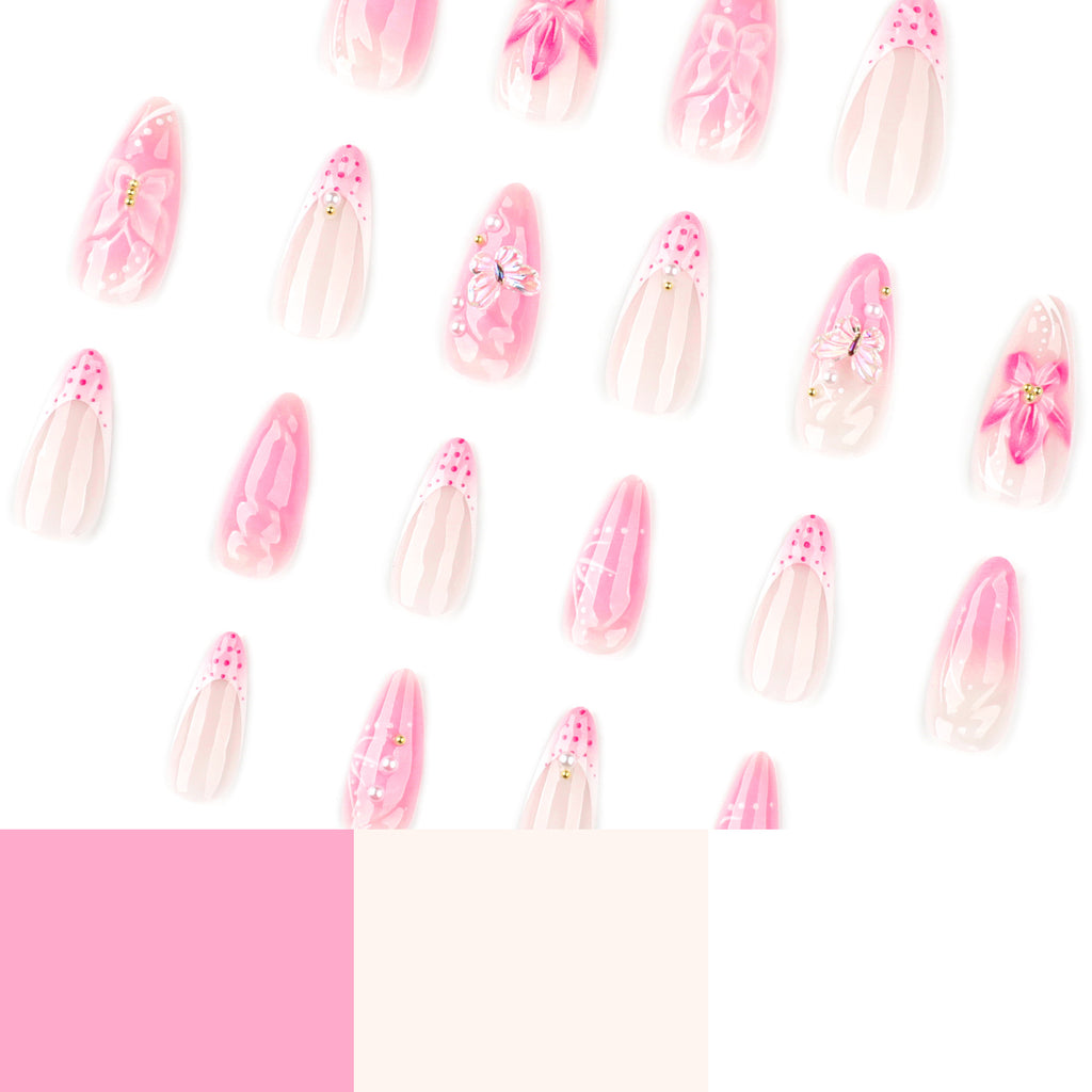 Short almond-shaped nail art with French-style pink color. Wearable artificial nails with 3D flower-shaped nail pieces.