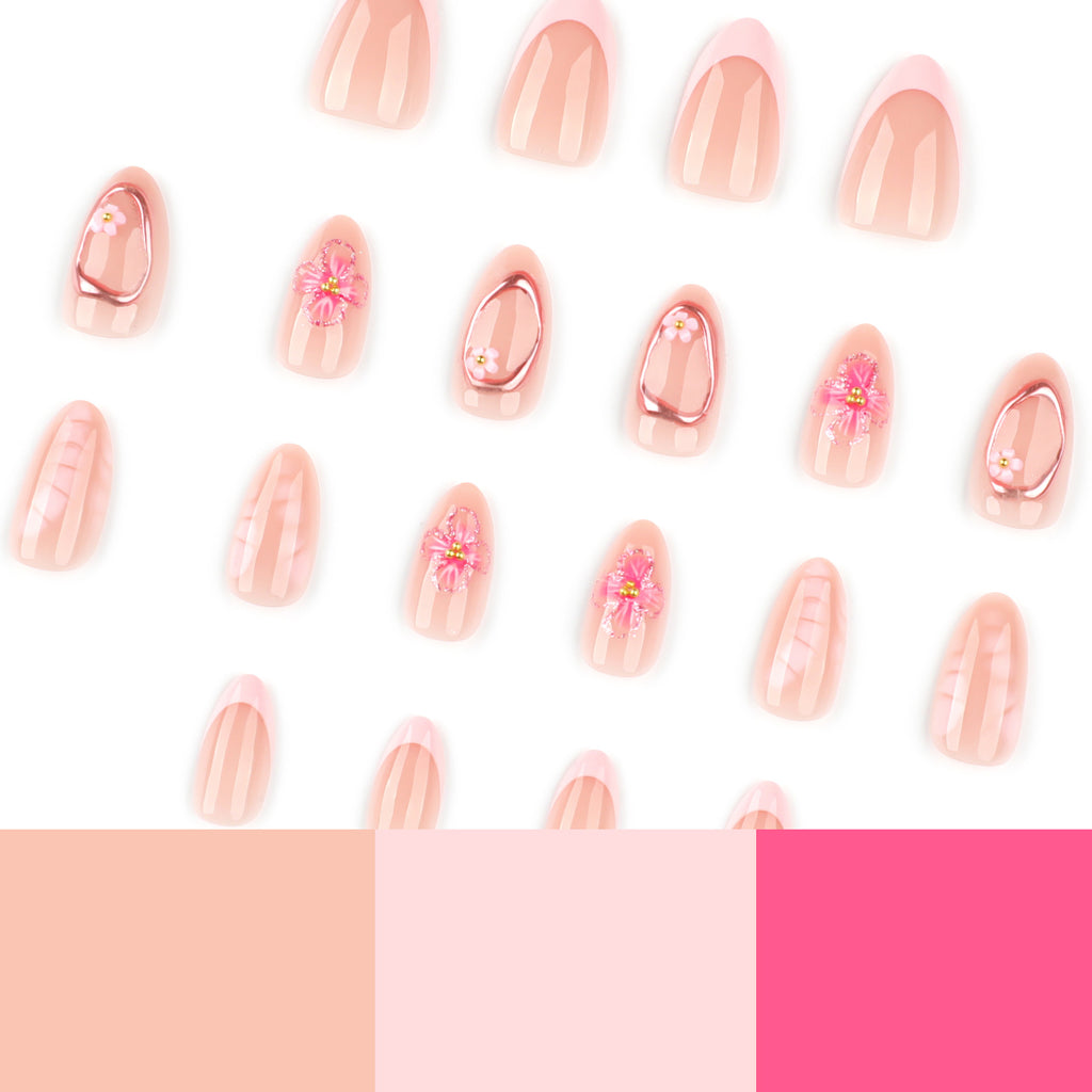 Short almond-shaped nail art with French-style pink color. Wearable artificial nails with 3D flower-shaped nail pieces.